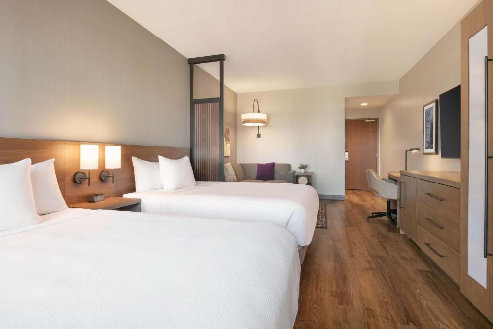 Queen Room with Two Queen Beds with Sofa Bed and Tub - Disability Access interior
